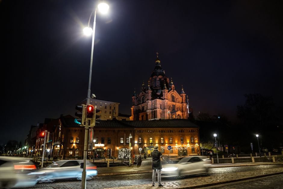 Evening view of Uspenski Cathedral illuminated against a night sky in Helsinki